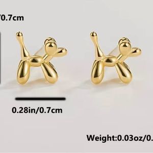 Sterling Silver Yellow Gold Plated Dog Earrings. Measures 1/4 “